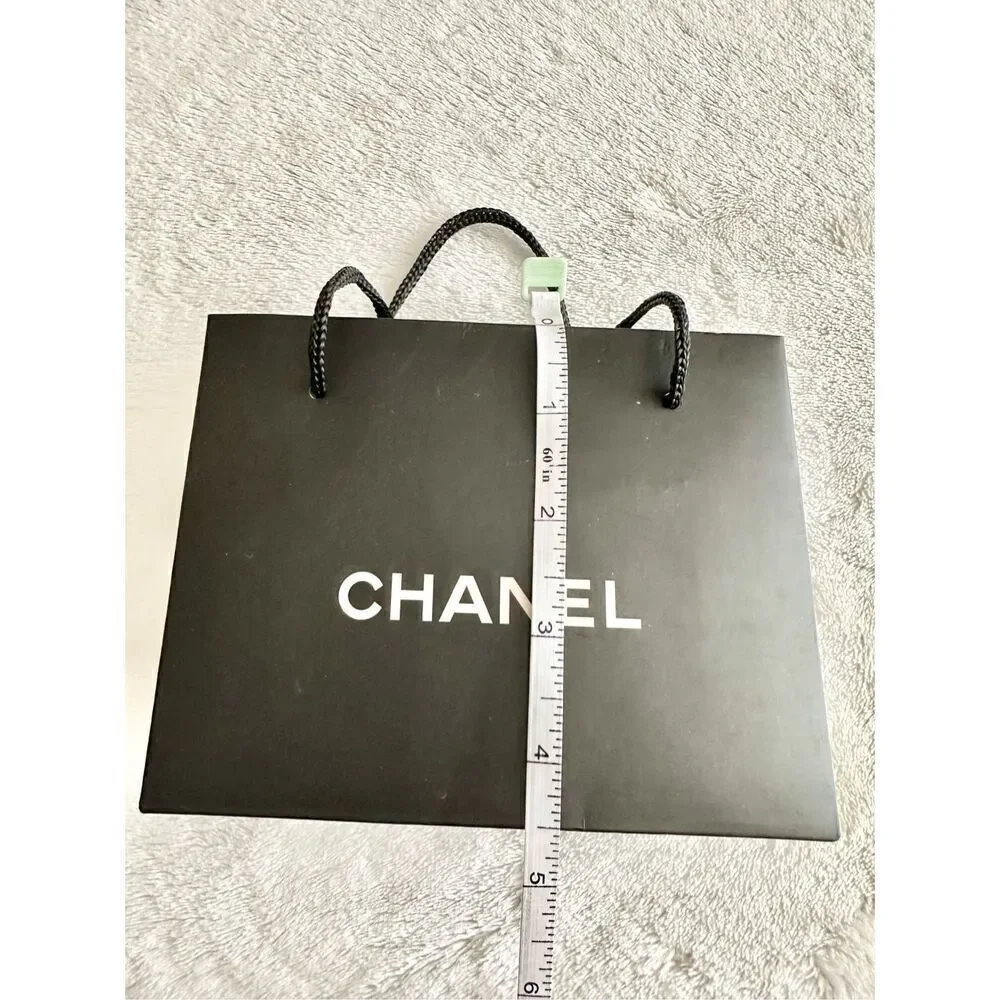 Small black Chanel gift bag ￼